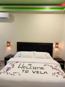 Postel nebo postele na pokoji v ubytování Velaa Garden View, Fodhdhoo- Maldives