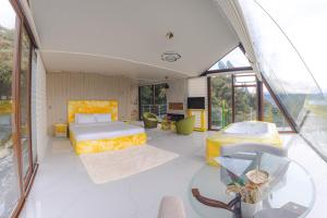 Khu vực ghế ngồi tại Pachamama Ecolodge Baños de Agua Santa