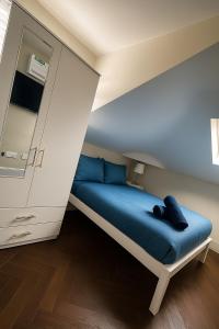 Ένα ή περισσότερα κρεβάτια σε δωμάτιο στο 30C The Luxury Studios near Arsenal and Central London