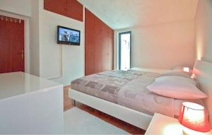 Ένα ή περισσότερα κρεβάτια σε δωμάτιο στο Cozy Home In Podstrana