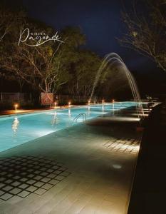 NimaimaにあるKoaの- 噴水のあるスイミングプール