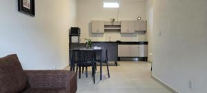 Η κουζίνα ή μικρή κουζίνα στο Moderno departamento en Lambaré cerca de todo