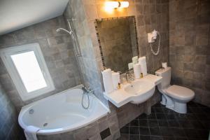 Koupelna v ubytování Hotel Cesario