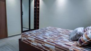 Giường trong phòng chung tại DAV Hills +5 ảnh