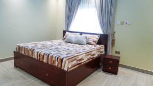 Giường trong phòng chung tại DAV Hills