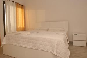 Postel nebo postele na pokoji v ubytování Comfort and Peace