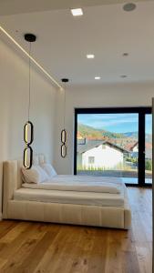 Postel nebo postele na pokoji v ubytování Alpine Loft