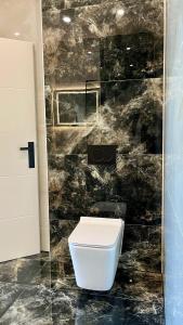 Koupelna v ubytování Alpine Loft + 3 fotografie