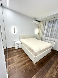 Postel nebo postele na pokoji v ubytování Opera House