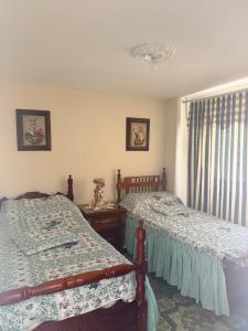 Voodi või voodid majutusasutuse Casa en Urrao Antioquía toas