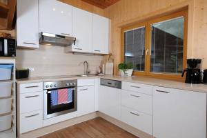 Η κουζίνα ή μικρή κουζίνα στο Ferienhaus Marie