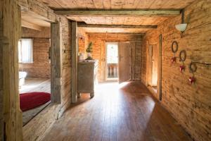 Ένα ή περισσότερα κρεβάτια σε δωμάτιο στο Bergchalet Heidialm