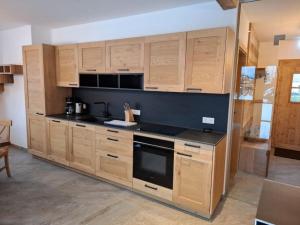 Η κουζίνα ή μικρή κουζίνα στο Chalet Katschberg Panorama