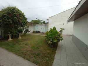 an empty yard in a house with a fence at Casa En Necochea 6 personas in Necochea