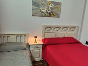 Postel nebo postele na pokoji v ubytování La Carolina Cabañas