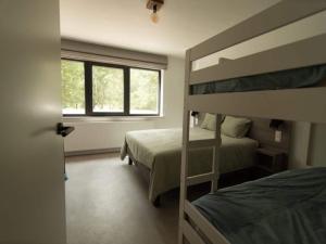 Postel nebo postele na pokoji v ubytování Holiday home with garden in Vieuxville