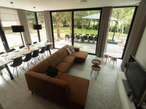 Posezení v ubytování Holiday home with garden in Vieuxville