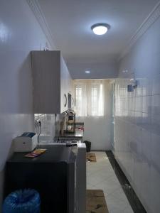 a kitchen that is being remodeled with a counter at Del's Homes -Ruiru in Ruiru +11 photos