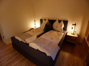 Ένα ή περισσότερα κρεβάτια σε δωμάτιο στο Dog-friendly holiday apartment in Bregenzerwald +20 φωτογραφίες