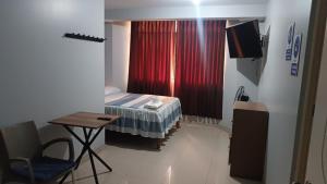 Ένα ή περισσότερα κρεβάτια σε δωμάτιο στο Hostal Vilchez