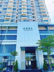 a large building with a nra logo on it at Winna Homestay - Nera Garden Huế in Thôn Văn Dương