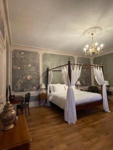 Postel nebo postele na pokoji v ubytování House of Mailly