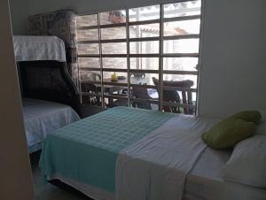 Postel nebo postele na pokoji v ubytování Casa vacacional El Oasis + 1 fotografie