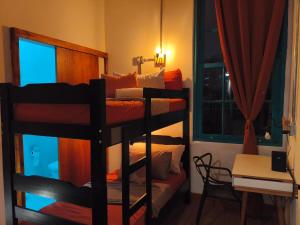 Postel nebo postele na pokoji v ubytování Hobi Hostel Boutique