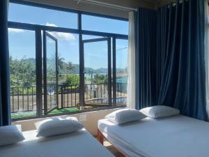 Postel nebo postele na pokoji v ubytování Cat Ba Rustic Homestay