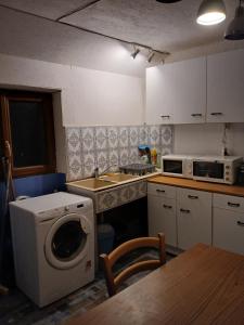 Η κουζίνα ή μικρή κουζίνα στο Chambre +14 φωτογραφίες