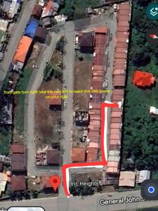 a map of a house with a red arrow at The Roam Inn - Fast Wifi Connection in Dipolog