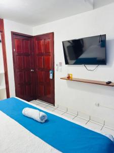 Μια τηλεόραση ή/και κέντρο ψυχαγωγίας στο Hotel Ocean View