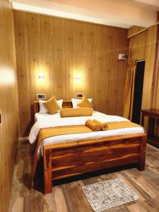 Postel nebo postele na pokoji v ubytování Tea Brook Lodge Ella