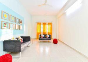 Et opholdsområde på Hotel O CLASSIC STAY