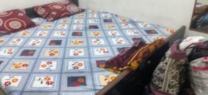 Ένα ή περισσότερα κρεβάτια σε δωμάτιο στο Murli Manohar homestay