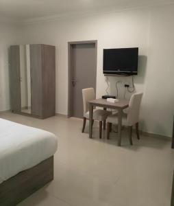 Μια τηλεόραση ή/και κέντρο ψυχαγωγίας στο Sovereign Hotel - Marriage Certificate Required