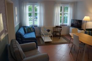 Posezení v ubytování Haus Buddenbrock auf Rügen