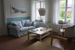 Posezení v ubytování Haus Buddenbrock auf Rügen