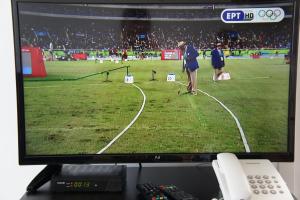 TV a/nebo společenská místnost v ubytování Rodos Beach
