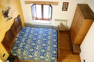 A bed or beds in a room at Bed and Breakfast San Firmano