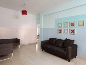 Et opholdsområde på Hotel O CLASSIC STAY