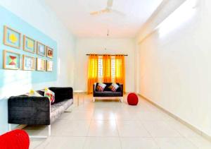 Et opholdsområde på Hotel O CLASSIC STAY