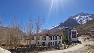 a building in the middle of a mountain at Serenity Stay Rangrik in Kaza