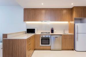 A kitchen or kitchenette at Astra Apartments Adelaide