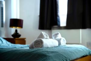 Postel nebo postele na pokoji v ubytování The Comfort Hub