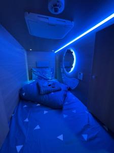 Postel nebo postele na pokoji v ubytování The GreenHouse Capsules