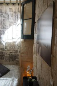 Postel nebo postele na pokoji v ubytování White Suite B&B