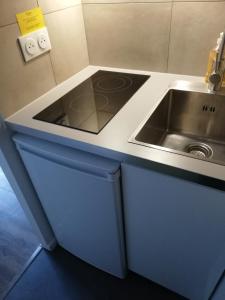 Kuchyň nebo kuchyňský kout v ubytování AMHotel Italie