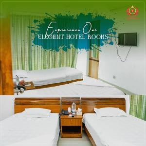 Ένα ή περισσότερα κρεβάτια σε δωμάτιο στο Hotel Ambassador