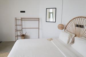 Ένα ή περισσότερα κρεβάτια σε δωμάτιο στο The Banyan Ahangama